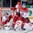 MINSK, BELARUS - MAY 17: Denmark's Simon Nielsen #31 follows a bouncing puck with Czech Republic's Jiri Hudler #24 attacking during preliminary round action at the 2014 IIHF Ice Hockey World Championship. (Photo by Richard Wolowicz/HHOF-IIHF Images)

